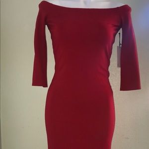 Off the shoulder red dress.